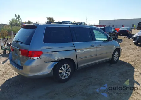 2010 Honda Odyssey Ex-L z USA, uszkodzony, nr VIN 5FNRL3H61AB107148